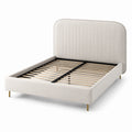 Lit double en bois et tissu beige avec pieds en métal