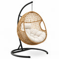 Fauteuil suspendu en rotin avec coussin beige et support métallique